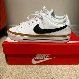 Nike White Sneakers with Gold and Black Accents